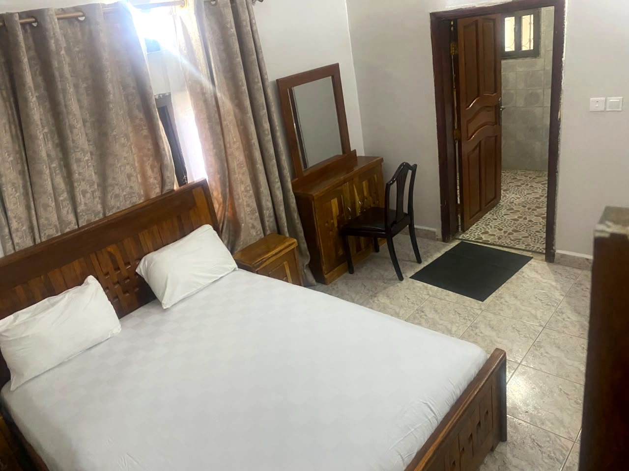 Bedroom 1 with dressing table and en-suite bathroom