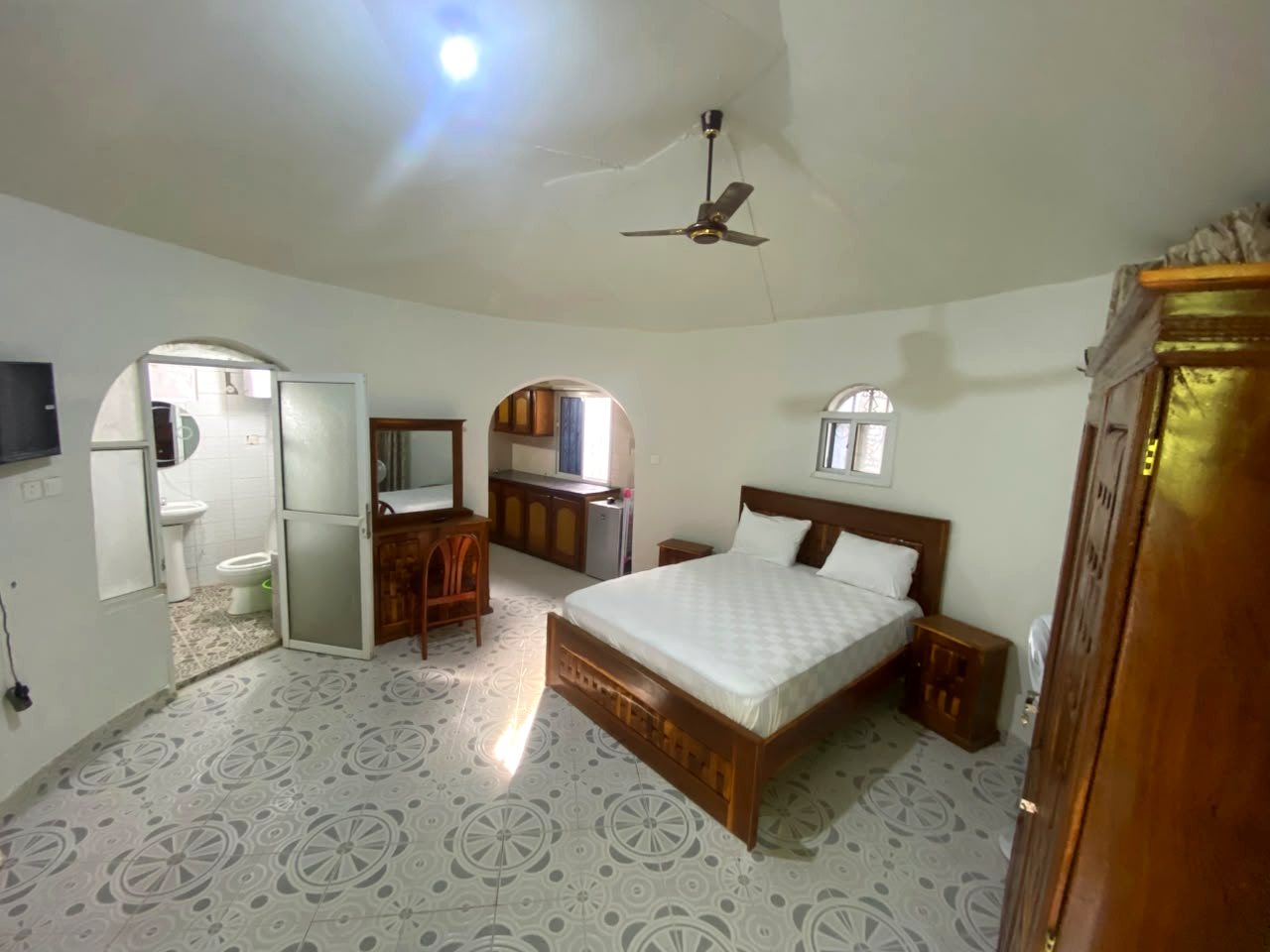 Bed, dressing table and kitchenette